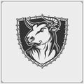 Label with aggressive bull. Corrida emblem. Print design for t-shirt.