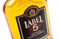 Label 5 bottle of Scotch Whisky on white background Royalty Free Stock Photo