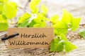 Label with Herzlich Willkommen