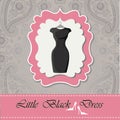 Label with little black dress.Paisley lace background