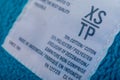 Label of shirt showing its size - XS TP estra small Royalty Free Stock Photo