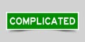 Label square green sticker in word complicated on gray background