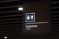 Label of symbol of toilet for men and women on blue plate, direction sign and navigation pointer WC restroom in building, airport