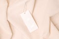 Label and Tag on beige velveteen fabric. mockup for design