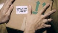 Labeling carton with MADE IN TURKEY sticker Royalty Free Stock Photo