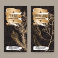 2 labels with tea tree and camphorwood branch sketch on black background.
