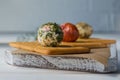 Labne balls with herbs and spices on a salty cookie. Traditional yogurt cream cheese in the Middle East. Close-up