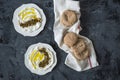 Labneh labaneh middle eastern soft white goat`s milk cheese with olive oil ,olives , za`atar , lemon, with pita bread over blac Royalty Free Stock Photo