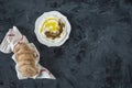 Labneh labaneh middle eastern soft white goat`s milk cheese with olive oil ,olives , za`atar , lemon, with pita bread over blac Royalty Free Stock Photo