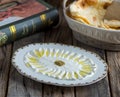 Labneh or labna served in a dish isolated on wooden background side view of appetizer
