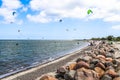 Lots of kite surfing activity at the Baltic Sea beach of Laboe i Royalty Free Stock Photo