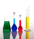 Labolatory glassware with colorful fluids isolated