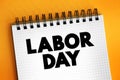 Labor Day - federal holiday in the United States celebrated on the first Monday in September, text concept on notepad Royalty Free Stock Photo