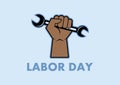 Labor Day with raised fist holding a wrench vector Royalty Free Stock Photo