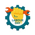 Labor Day May 1st. A fist clenching a wrench in a gear, isolated on a white background.