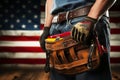 Labor Day mockup Gloved laborer, toolbelt, measure on US flag backdrop exudes dedication