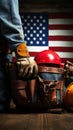 Labor Day mockup Gloved laborer, toolbelt, measure on US flag backdrop exudes dedication