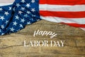 Labor Day Text Over Old Wood Wall Texture Background and American Flags Royalty Free Stock Photo