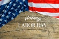 Labor Day Text Over Old Wood Wall Texture Background and American Flags Royalty Free Stock Photo