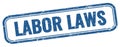 LABOR LAWS text on blue grungy vintage stamp Royalty Free Stock Photo