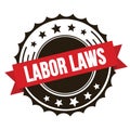 LABOR LAWS text on red brown ribbon stamp Royalty Free Stock Photo