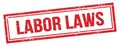 LABOR LAWS text on red grungy vintage stamp Royalty Free Stock Photo