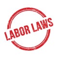 LABOR LAWS text written on red grungy round stamp Royalty Free Stock Photo