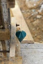 Labor man using a plumb bob for check Royalty Free Stock Photo