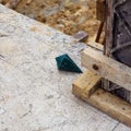 Labor man using a plumb bob for check Royalty Free Stock Photo