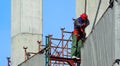 Labor man working on construction site with helmet. Royalty Free Stock Photo