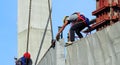 Labor man working on construction site with helmet. Royalty Free Stock Photo