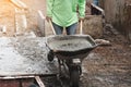 Labor work concrete with cart Royalty Free Stock Photo