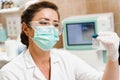 Laboratory assistant holds test tubes for gynecological and cytological analysis. Woman scientist working in medical lab Royalty Free Stock Photo