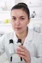 Laboratory assistant in the laboratory of of food quality.Cell culture assay to test genetically modified seed Royalty Free Stock Photo