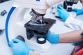 Laboratory assistant with a microscope. Medical laboratory for the study of analyzes Royalty Free Stock Photo