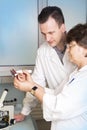 Laboratory assistants study petri