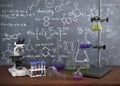 Laboratory chemical test tubes and objects on the table with ch Royalty Free Stock Photo