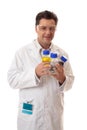 Laboratory chemist holding bottles of chemicals Royalty Free Stock Photo