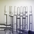 Laboratory. Development of a coronavirus vaccine. Ampoules with medicine. COVID 19. Macro photography, selective focus