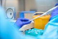 Laboratory employee analyzes biomaterial in a sterile room