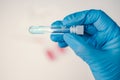 A laboratory employee taking sample PCR microtubes with cotton swab test. Diagnostic testing for COVID-19. The concept Royalty Free Stock Photo