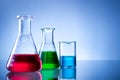 Laboratory equipment, bottles, flasks with color liquid Royalty Free Stock Photo