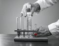 Laboratory Experiment with Test Tubes and Measuring Instruments Royalty Free Stock Photo