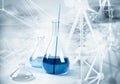 Laboratory flask on abstract science background Royalty Free Stock Photo