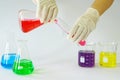 Laboratory Glass Erlenmeyer conical flask, Beaker and Test Tube filled with chemical liquid Royalty Free Stock Photo