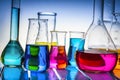 Laboratory glass filled with chemical liquids. Royalty Free Stock Photo