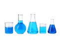Laboratory glassware with blue liquids isolated