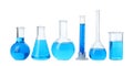 Laboratory glassware with blue liquids on white