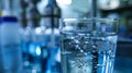 Laboratory glassware containing liquid with bubbles in a science research lab Royalty Free Stock Photo