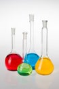 Laboratory glassware with liquids of different colors Royalty Free Stock Photo